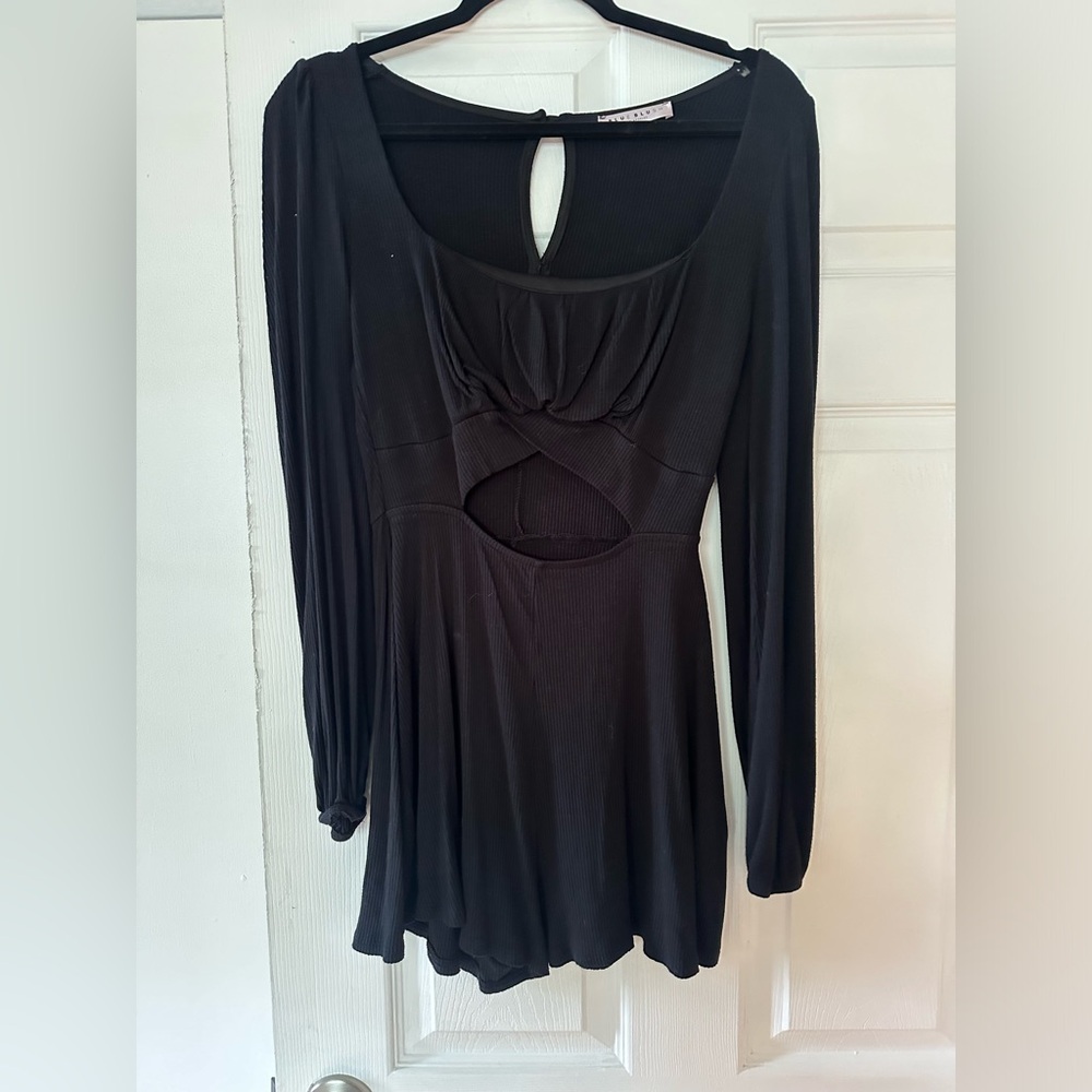 Black romper with cut out in the middle